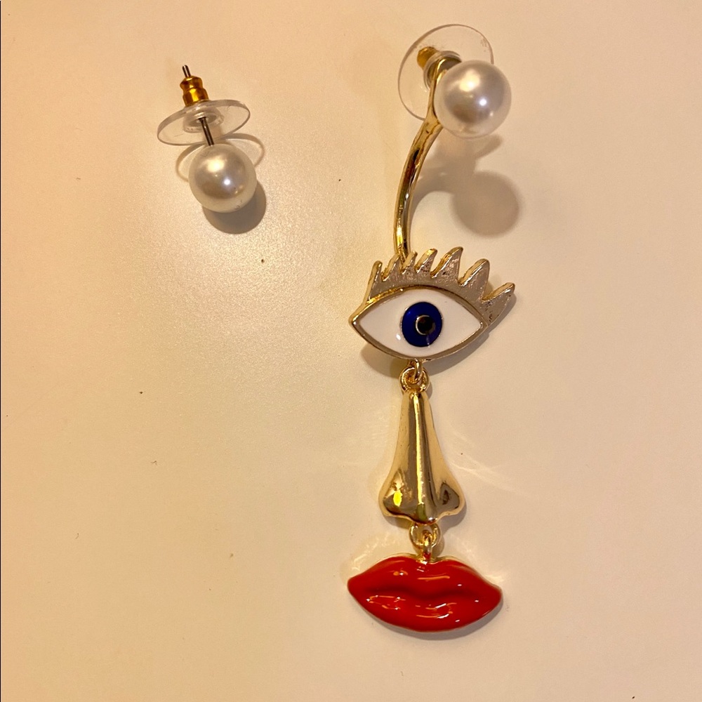Artsy Asymmetrical pearl face earrings